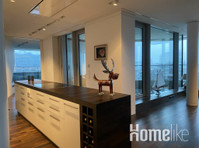 Luxus-Wohnung im Marco-Polo-Tower mit Blick auf die Elbe - Wohnungen