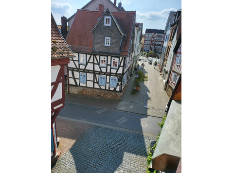 Historical half-timbered house in the middle of Butzbach -… - Te Huur