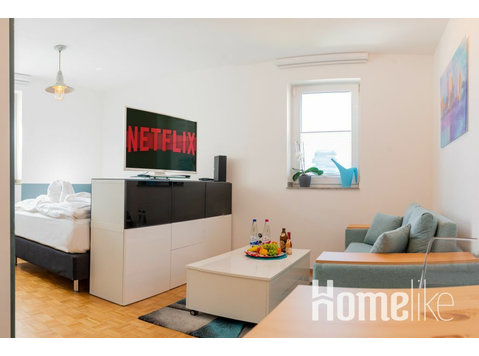 Een appartement combineert functionaliteit met levendige… - Appartementen