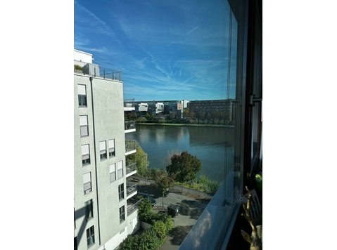 Luxury Apartment with River and Skyline View - Vuokralle