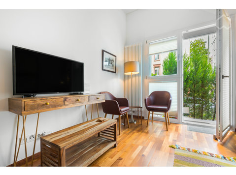 Schickes City-Apartment mit privater Terrasse im Herzen von… - Zu Vermieten