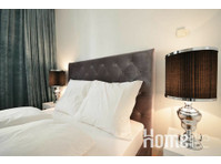 Elegant and fully furnished business apartment with 1… - อพาร์ตเม้นท์