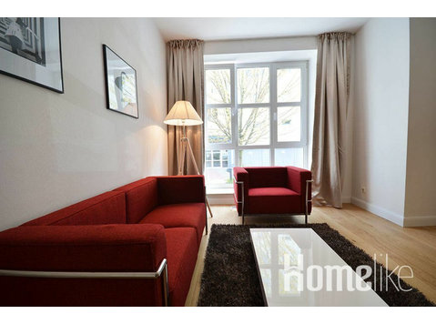 Exquisite, fully furnished 1-bedroom designer apartment for… - Dzīvokļi