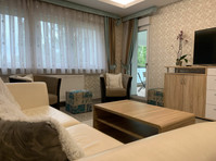 Charming 3-Room Apartment with Stunning Rhine Views and… - Annan üürile