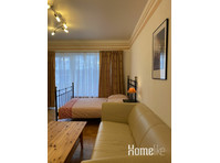 Furnished 1-room apartment with separate kitchen, high… - Apartments