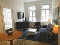 Spacious apartment with high ceilings in Town center - Te Huur