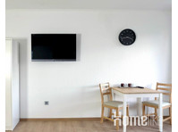 Two bed studios for fitters | kitchen - 	
Lägenheter
