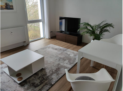 Modern, central apartment on time with underground parking… - For Rent