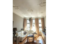 Outstanding luxury flat in an historic building with 7… - K pronájmu