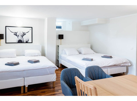 Modern eingerichtetes Apartment für 8 Personen direkt am… - Zu Vermieten