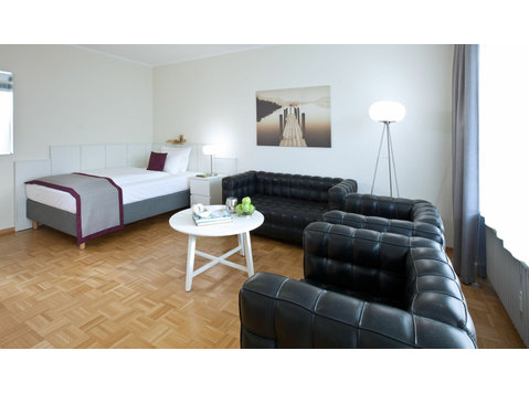 Well equipped serviced apartment with balcony at the gates… - Alquiler