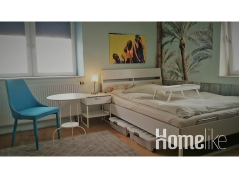 Studio with Caribbean flair in the heart of Pulheim - דירות