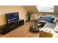 "Centrally Located Penthouse Apartment in Aachen - Your New… - Izīrē