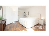 Furnished apartment with box spring bed at the Ponttor - Apartments