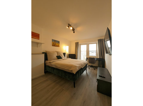 EM-APARTMENTS DE Cozy room in the heart of the city - Aluguel