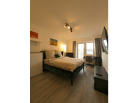 EM-APARTMENTS DE Cozy room in the heart of the city - Alquiler