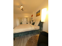 EM-APARTMENTS DE Cozy room in the heart of the city - Alquiler