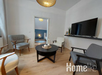 Cozy family apartment near the train station and Norpark! - Apartemen