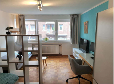 Apartment in Merowingerstraße - شقق