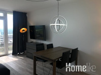Excellently renovated apartment above the roofs of Cologne… - Lakások