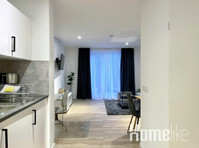 Apartments in the city center | kitchen I private parking - شقق