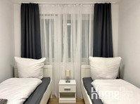 Apartments in the city center | kitchen I private parking - Apartamentos