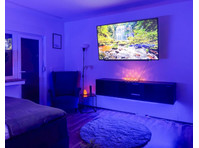 Entspannende Oase mit 65 SmartTV, Küche und Balkon. - Zu Vermieten