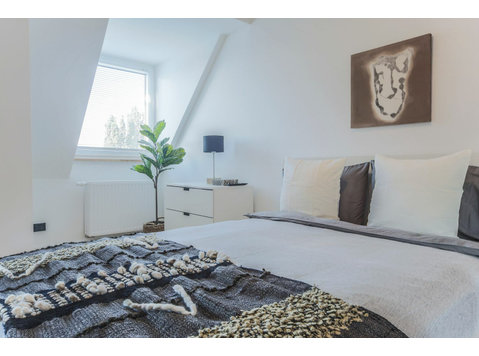Above the roofs. Modern attic apartment in the zoo district - For Rent