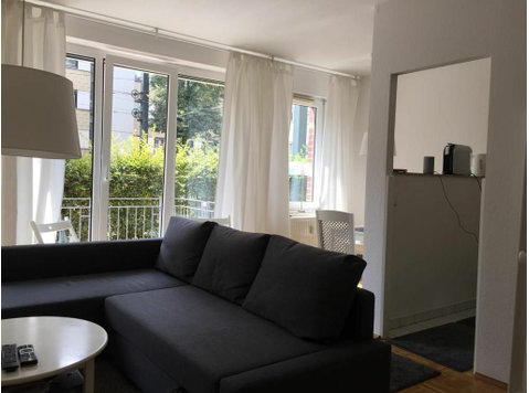Perfektes, modernes Apartement am Rhein, Balkon und TG-Platz - Zu Vermieten