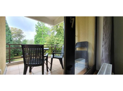 Charming apartment with 2 bathrooms near City on the forest - الإيجار