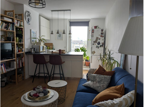 Charming, bright 2-room flat with open-plan kitchen and… - For Rent