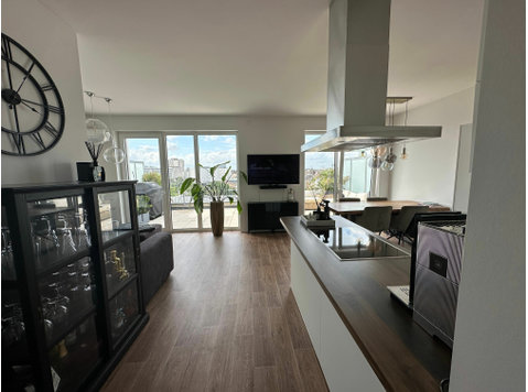 Luxurious penthouse with view over the roofs of Düsseldorf - For Rent