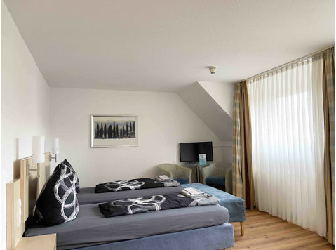 Trendy two-bed studio with kitchen - Aluguel