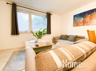 High-quality, modern and centrally located apartment in… - Apartmány
