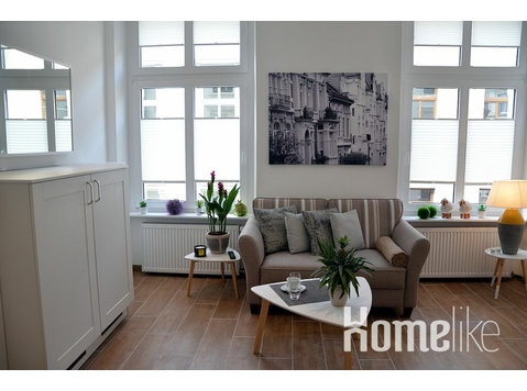 Old building meets modernity - as new comfort apartment in… - Квартиры