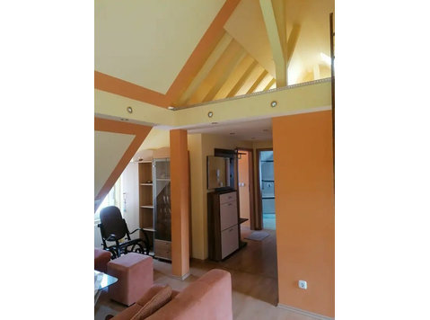 As good as new attic flat with two and a half rooms as well… - Aluguel