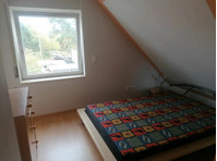 As good as new attic flat with two and a half rooms as well… - Te Huur