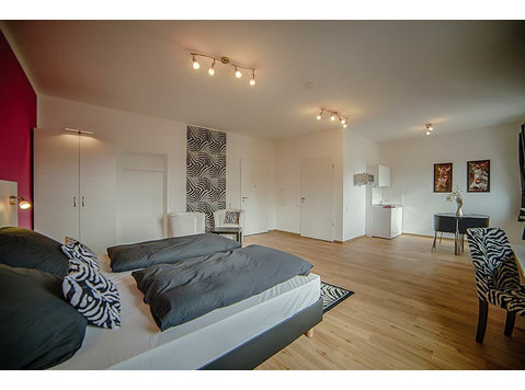 Fully furnished, all-inclusive living in a prime downtown… - For Rent