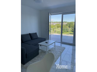 Huge roof terrace with a view of the nature reserve - דירות