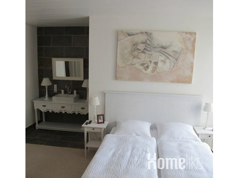Deluxe Tweepersoonskamer met 1 of 2 Bedden en Uitzicht op… - Appartementen