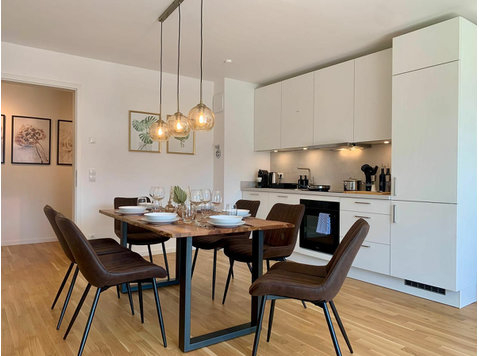 Modern 2-bedroom apartment with a balcony and underground… - For Rent