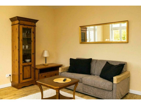 Möblierte Komfort-Wohnung mit Blick auf das Holstentor - Zu Vermieten
