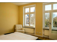 Furnished comfort apartment with a view of the Holsten Gate - Te Huur