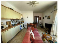 A first floor one bedroom apartment in Makry Gialos. - Appartements