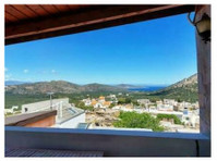 House on two levels enjoying sea views 3.4km from Tholos sea - Houses