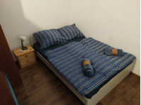 Flatio - all utilities included - Big room with TV, sofa,… - Collocation