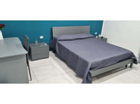 Stanza con bagno condiviso - Asunnot