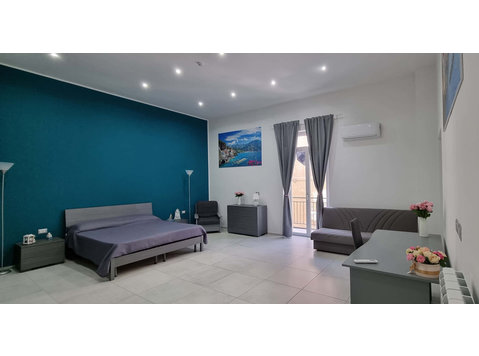 Stanza con bagno privato - Apartments