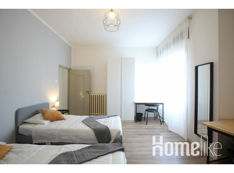 Habitación compartida (2 camas) en Crocetta, Módena - Pisos compartidos