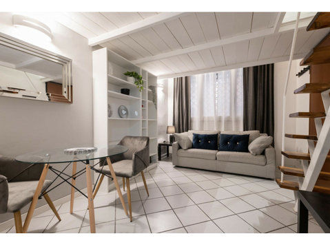 Flatio - all utilities included - Sublime 1-bedroom duplex… - K pronájmu